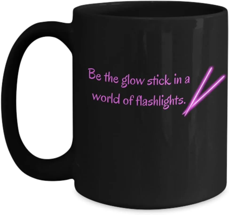 Be the glow stick in a world of flashlights black mug pink text ceramic 11 or 15 oz.